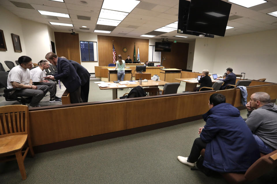 Thurston County Superior Court Judge Christine Schaller listens as Jamie Cline appears before her during a drug court session in Thurston County Superior Court Tuesday, Dec. 17, 2019, in Olympia, Wash. While in a jail work-release program this past spring, Cline, a former heroin user, took a medication called buprenorphine. A new treatment philosophy called "medication first" scraps requirements for counseling, abstinence or even a commitment to recovery. (AP Photo/Elaine Thompson)