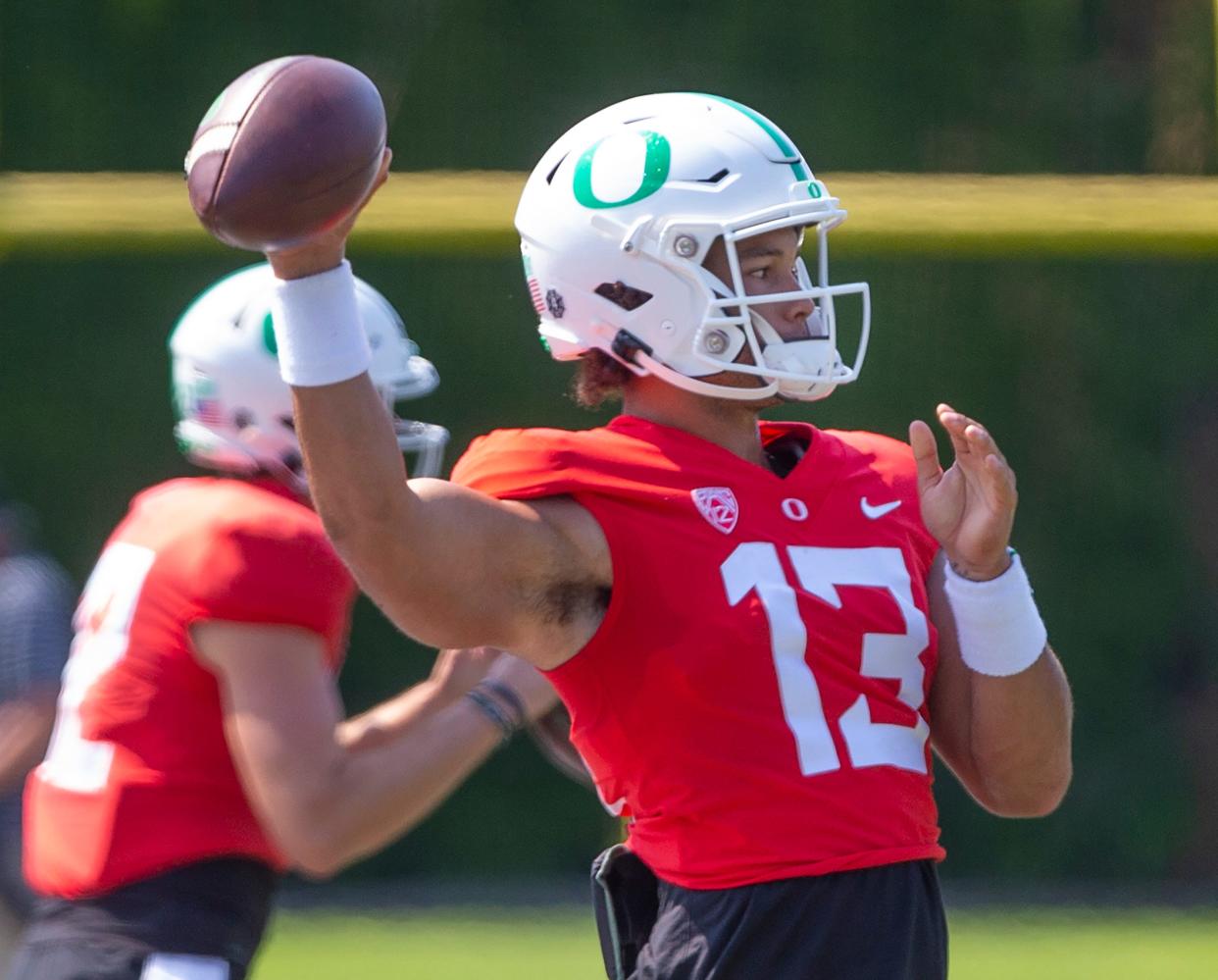 Oregon quarterback Ty Thompson works out with the Ducks fall football camp on Aug. 8, 2022.