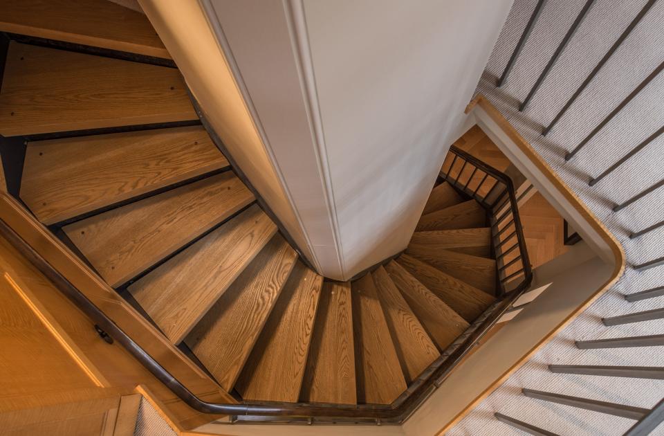 The oak-and-steel spiral staircase is an incredible design element from any angle.