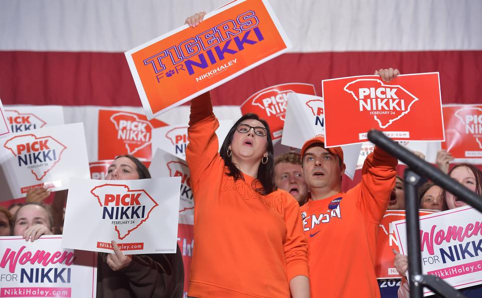 Nikki Haley, GOP presidential candidate, campaigns at Mauldin High School in Mauldin, S.C., on Jan. 27, 2024. A group of supporters on the stage greet Haley.