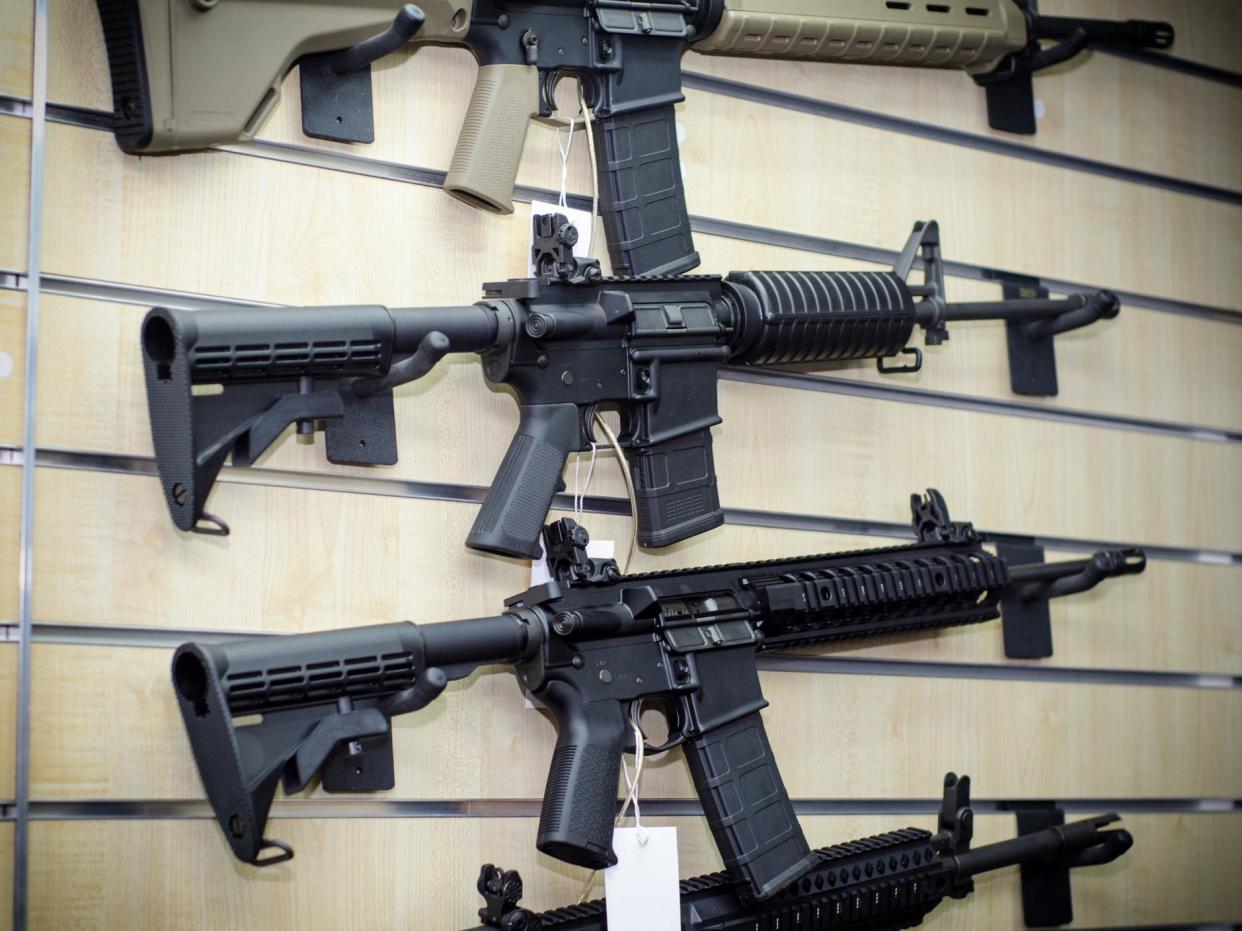 Gun wall rack with rifles - Getty Images/iStockphoto: Getty Images/iStockphoto