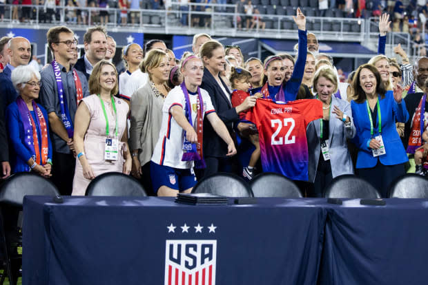 WASHINGTON, DC - SEPTEMBER 06: Members of U.S. Soccer and the U.S. Women's National Team Players Association hold up an Equal Pay jersey after signing a collective bargaining agreement signifying equal pay between the men's and women's national soccer teams at Audi Field on <a href="https://parade.com/living/september-holidays-observances" rel="nofollow noopener" target="_blank" data-ylk="slk:September;elm:context_link;itc:0;sec:content-canvas" class="link ">September</a> 06, 2022 in Washington, DC <p><a href="https://www.gettyimages.com/detail/1243000353" rel="nofollow noopener" target="_blank" data-ylk="slk:Ira L. Black - Corbis/Getty Images;elm:context_link;itc:0;sec:content-canvas" class="link ">Ira L. Black - Corbis/Getty Images</a></p>