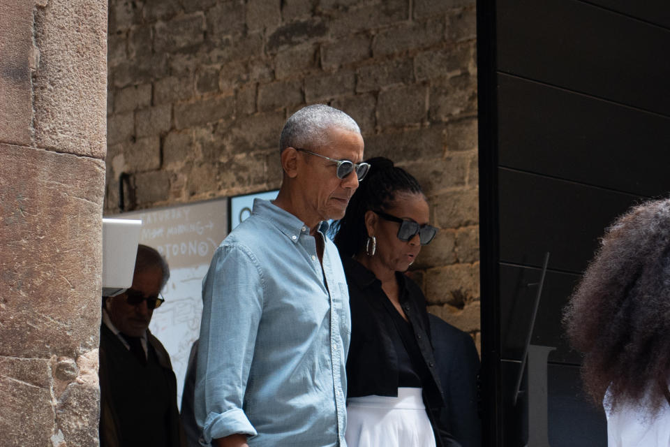 BARCELONA CATALONIA, SPAIN - APRIL 28: Former U.S. President Barack Obama and former first lady Michelle Obama as they leave the Moco Museum on April 28, 2023 in Barcelona, Catalonia, Spain. Barack Obama and his wife, Michelle Obama, landed last night in Barcelona to attend the Bruce Springsteen concert. Obama visits Barcelona, but tomorrow, April 29th, he leaves Barcelona to attend a series of European conferences starting in Zurich (Germany). The former first lady will stay one more day, according to sources familiar with the agenda. (Photo By David Zorrakino/Europa Press via Getty Images)