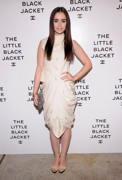 Lily Collins attends Chanel's:The Little Black Jacket Event wearing Chanel pre fall, 2012. The Swiss Institute on June 6, 2012 in New York City. (Photo by Jamie McCarthy/Getty Images)