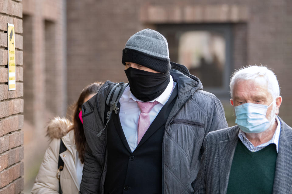 John Doak, 37, (centre) arrives at Chelmsford Crown Court in Essex for sentencing. (PA Images)