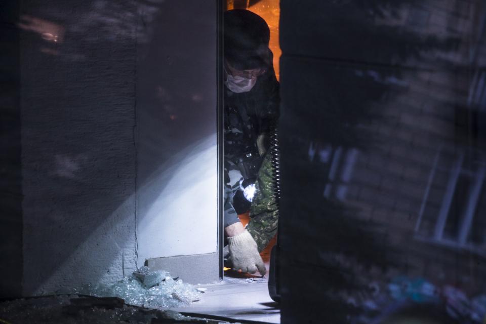 <p>An investigator works inside the supermarket after an explosion, in St. Petersburg, Russia, Thursday, Dec. 28, 2017. (Photo: Dmitri Lovetsky/AP) </p>