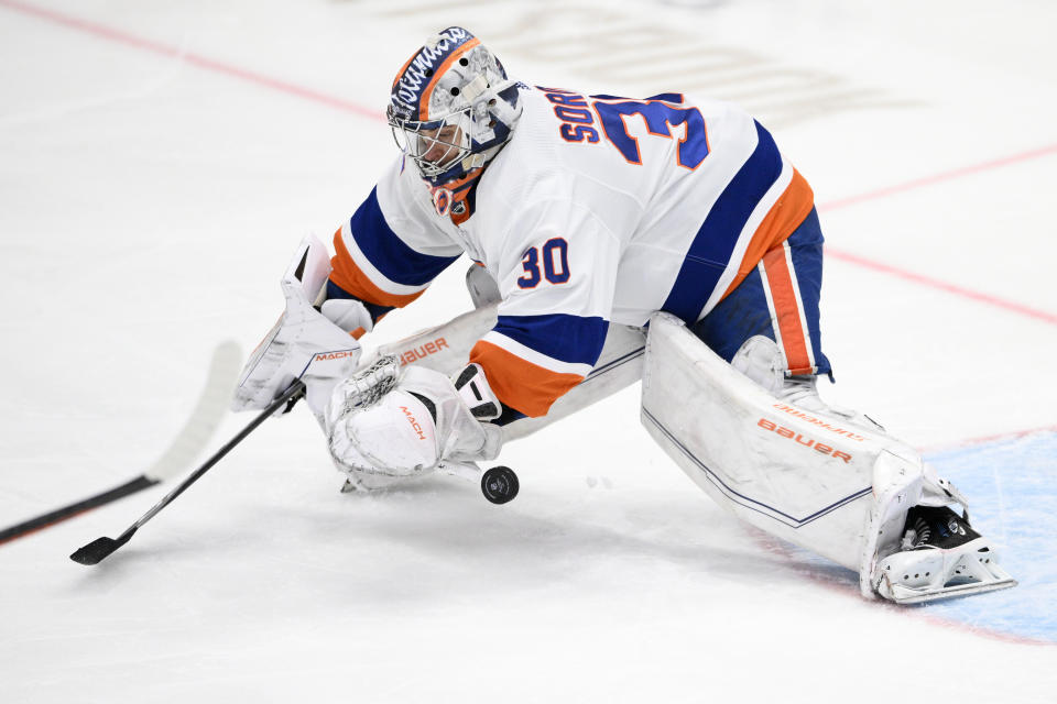New York Islanders goaltender Ilya Sorokin stops the puck during the third period of an NHL hockey game against the Washington Capitals, Monday, April 10, 2023, in Washington. The Capitals won 5-2. (AP Photo/Nick Wass)