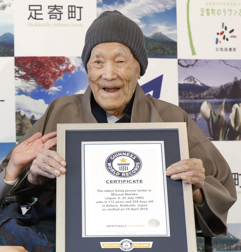 Masazo Nonaka,&nbsp;seen in April, eats cake after being recognized by Guinness World Records as the world's oldest living man in 2018. (Photo: ASSOCIATED PRESS)