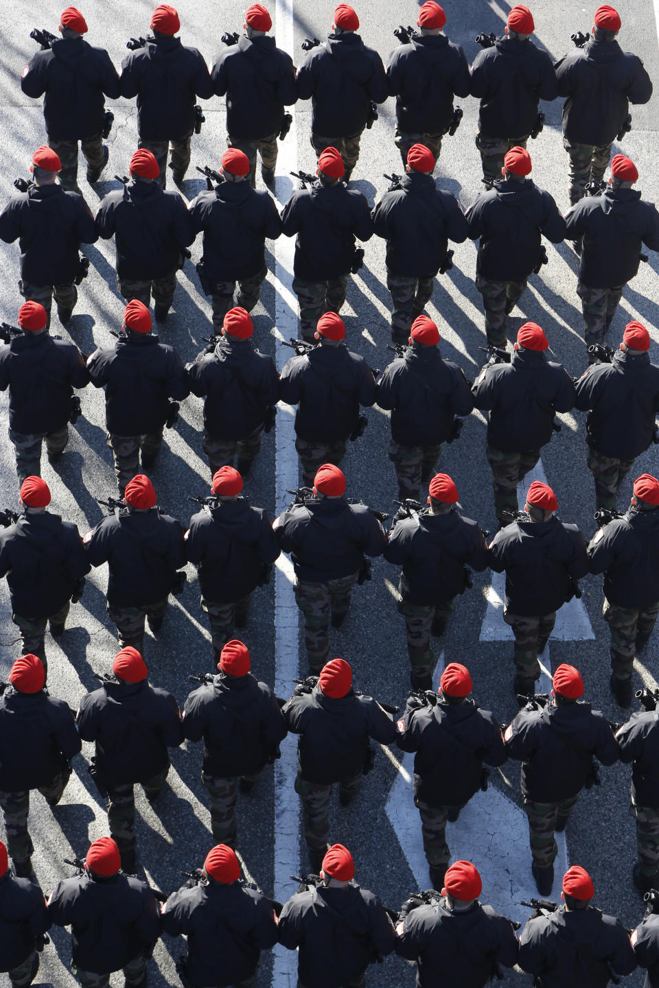 Members of the police forces of the Republic of Srpska, an entity of Bosnia and Herzegovina, march during parade marking the 27th anniversary of the Republic of Srpska, in the Bosnian town of Banja Luka, Wednesday, Jan. 9, 2019, celebrating a controversial holiday despite strong opposition from other ethnic groups in Bosnia who view it as discriminatory. The Jan. 9 holiday marks the date in 1992 when Bosnian Serbs declared the creation of their own state in Bosnia, igniting the country's devastating four-year war that killed over 100,000 people and left millions homeless. (AP Photo/Amel Emric)