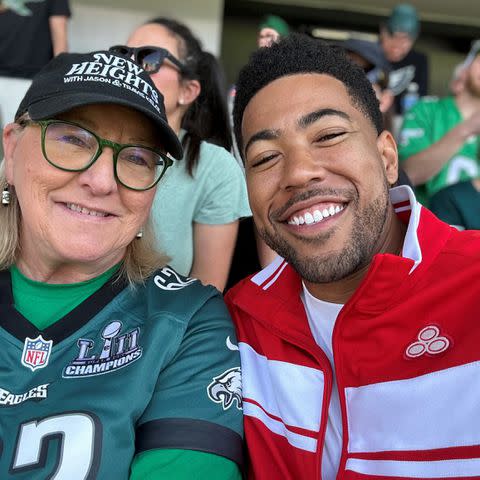 <p>Jake from State Farm/X</p> Donna Kelce and Jake From State Farm at the Eagles Game in October 2023.