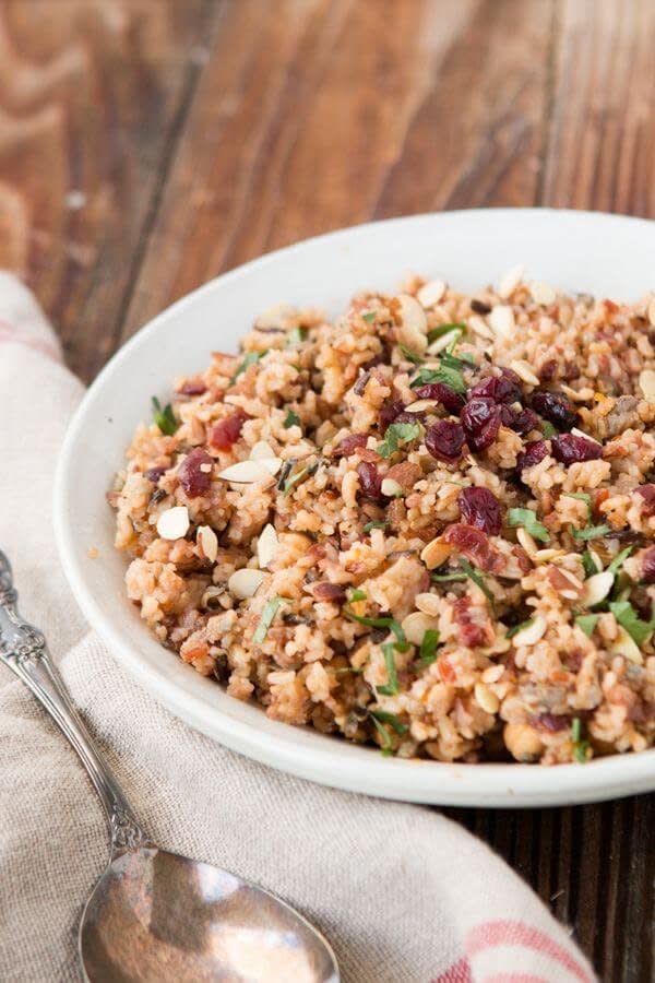 <strong>Get the <a href="https://ohsweetbasil.com/orange-cranberry-almond-rice-pilaf-recipe/" target="_blank">Orange Cranberry Almond Rice Pilaf recipe</a>&nbsp;from&nbsp;Oh Sweet Basil</strong>