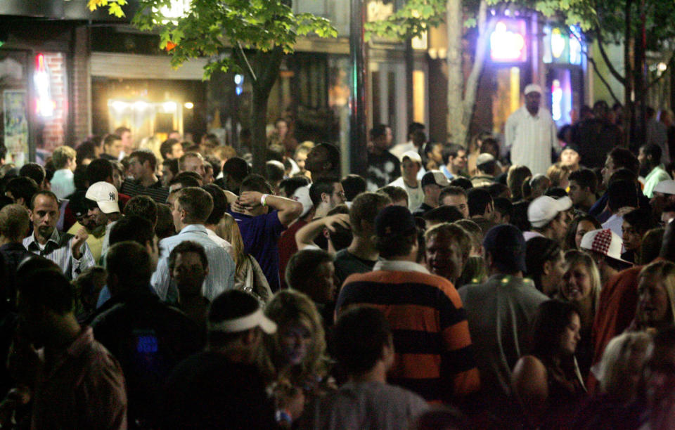 In this Oct. 14, 2010, photo pedestrian mall is filled with people as bars empty out following last call in Iowa City, Iowa. The Princeton Review named the University of Iowa as the nations's best party school Monday, Aug. 5, 2013, on a list determined by 126,000 students in a nationwide survey. (AP Photo/Iowa City Press Citizen, Dan Williamson)