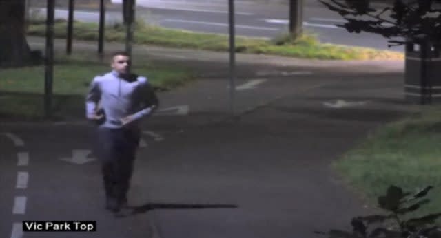 CCTV image of Charlie John Pearce running through Leicester's Victoria Park clutching the paving slab (Leicestershire Police/PA)