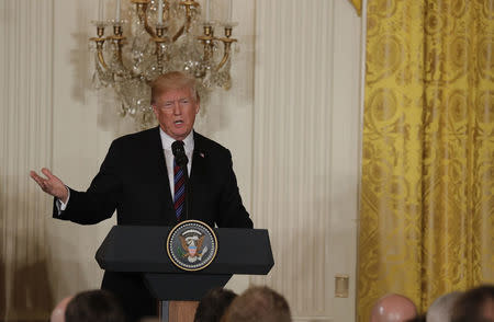 U.S. President Donald Trump holds a joint news conference with Lithuania's President Dalia Grybauskaite and other Baltic leaders at the White House in Washington, U.S., April 3, 2018. REUTERS/Carlos Barria