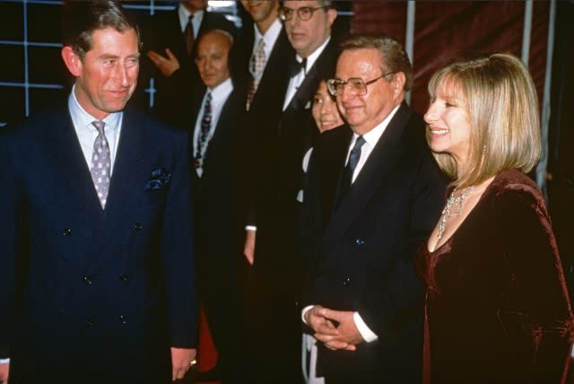 Prince Charles, Prince of Wales smiles as he meets Marvin Hamlisch (4th R), Martin Erlichman (2nd R) and Barbra Streisand (R), backstage during a champagne reception ahead of a Gala performance in aid of The Prince's Trust at Wembley Arena on April 25, 1994 in London, United Kingdom. (Photo by Anwar Hussein/Getty Images)