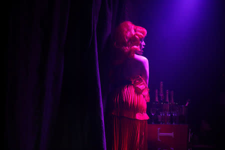 A drag queen performs at a club in Bangkok, Thailand March 11, 2018. REUTERS/Athit Perawongmetha