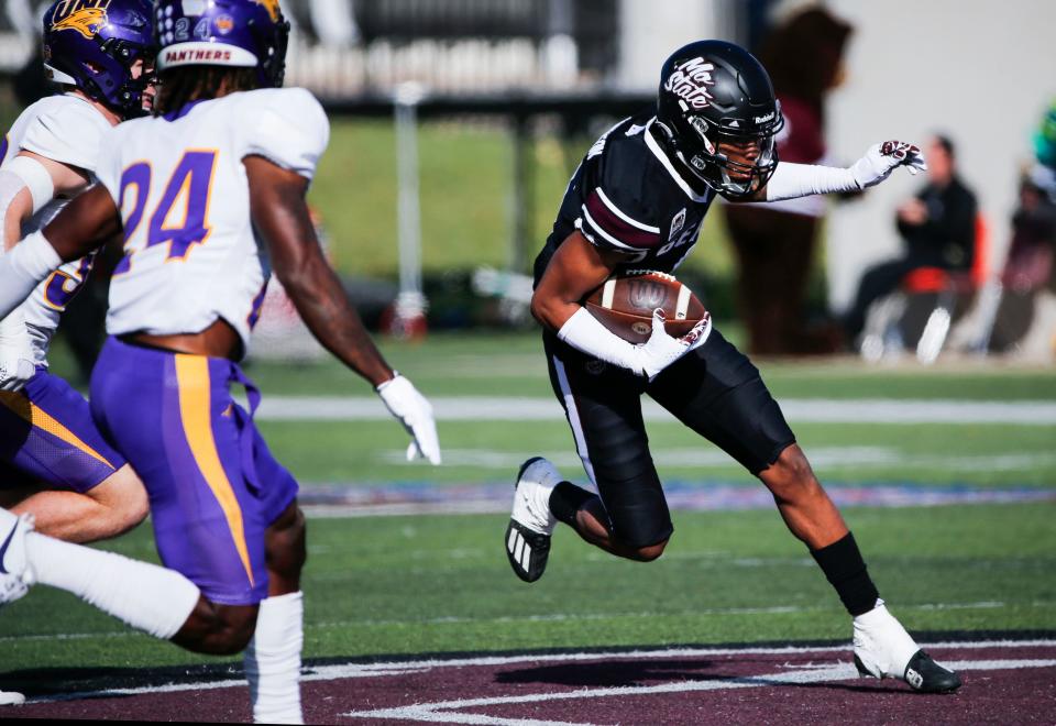 Missouri State's Jmariyae Robinson (0) carries the ball during a game against the University of Northern Iowa Panthers at Plaster Stadium on Saturday, Nov. 11, 2023.