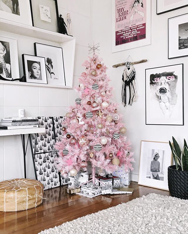 <p>When planked in the midst of a black and white room, a pink tree takes on a Parisian chic vibe. It feels like something Audrey Hepburn would approve of.</p>