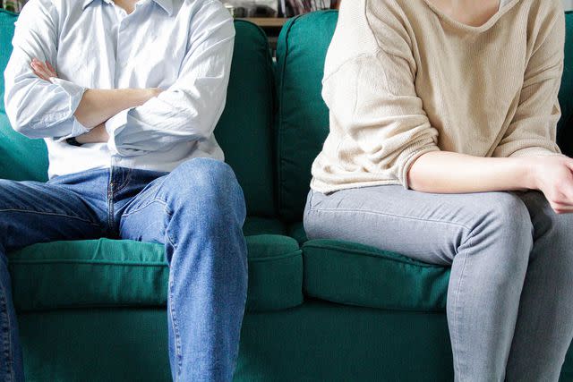 <p>getty</p> Stock photo of two people sitting away from each other.