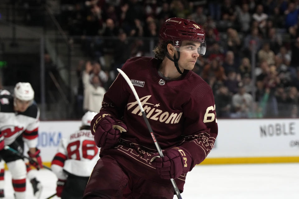 Arizona Coyotes left wing Matias Maccelli reacts after scoring a goal against the New Jersey Devils in the first period during an NHL hockey game, Sunday, March 5, 2023, in Tempe, Ariz. (AP Photo/Rick Scuteri)