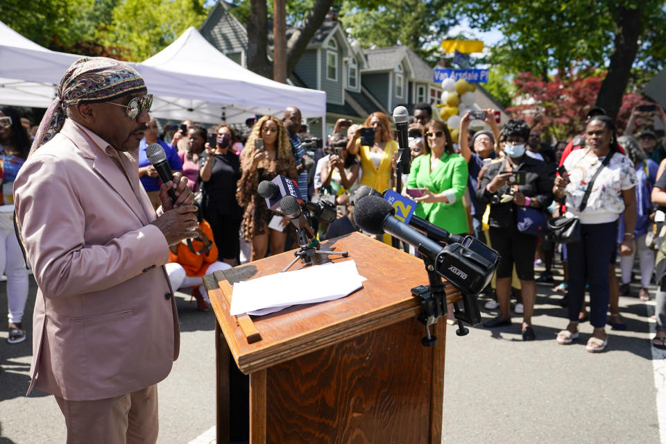 Ernie Isley speaks to members of the community during a street renaming ceremony, Thursday, June 24, 2021, in Teaneck, N.J. Two New Jersey towns have renamed streets in honor of the Isley Brothers, the legendary R&B group that behind songs such as, "Shout," "Twist and Shout" and "It's Your Thing." Ron Isley and Ernie Isley attended separate ceremonies Thursday in Teaneck and Englewood, neighboring towns outside New York City where they lived during the band's heyday in the 1960s. (AP Photo/Mary Altaffer)