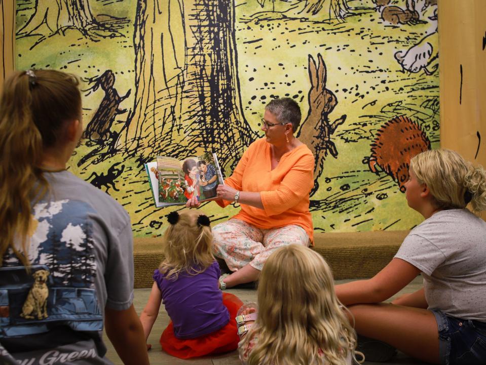 Tammy Knutson reads her book, "A Family for Riley," to group of kids at a book signing event on Saturday, August 6, at Barnes & Noble in Sioux Falls.