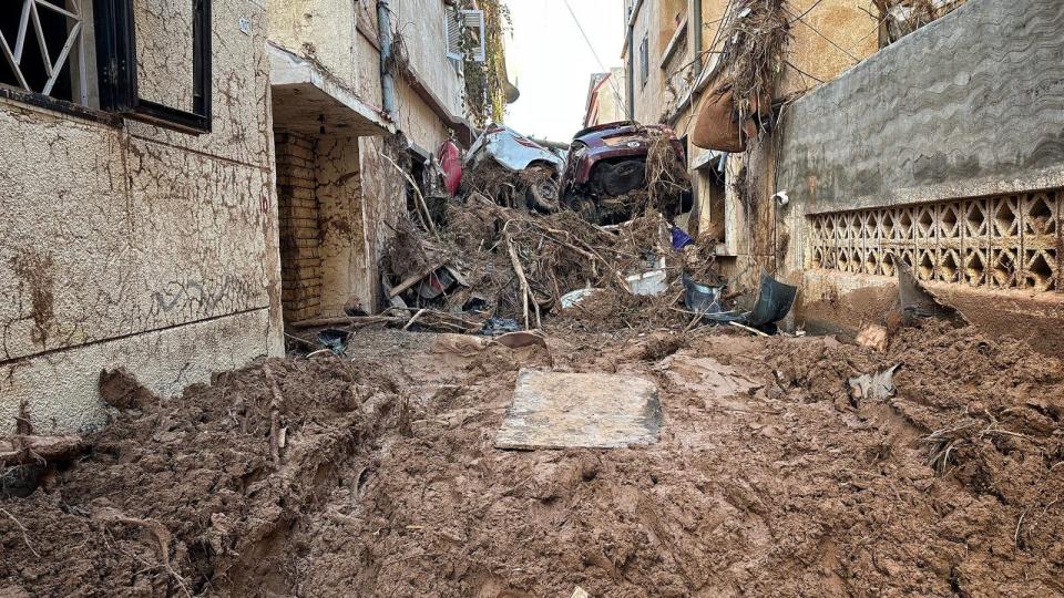 Cars swept away by devastating floods in Derna, Libya. (Sky News)