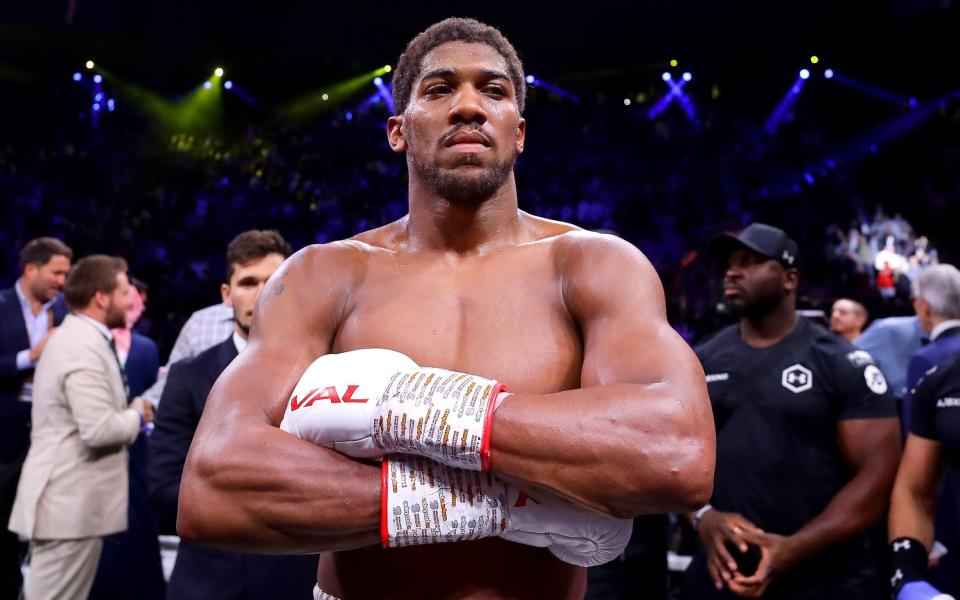 Anthony Joshua celebrates victory over Andy Ruiz Jr during the IBF, WBA, WBO & IBO World Heavyweight Title Fight between Andy Ruiz Jr and Anthony Joshua during the Matchroom Boxing 'Clash on the Dunes' show at the Diriyah Season on December 07, 2019 in Diriyah, Saudi Arabia  - Getty Images