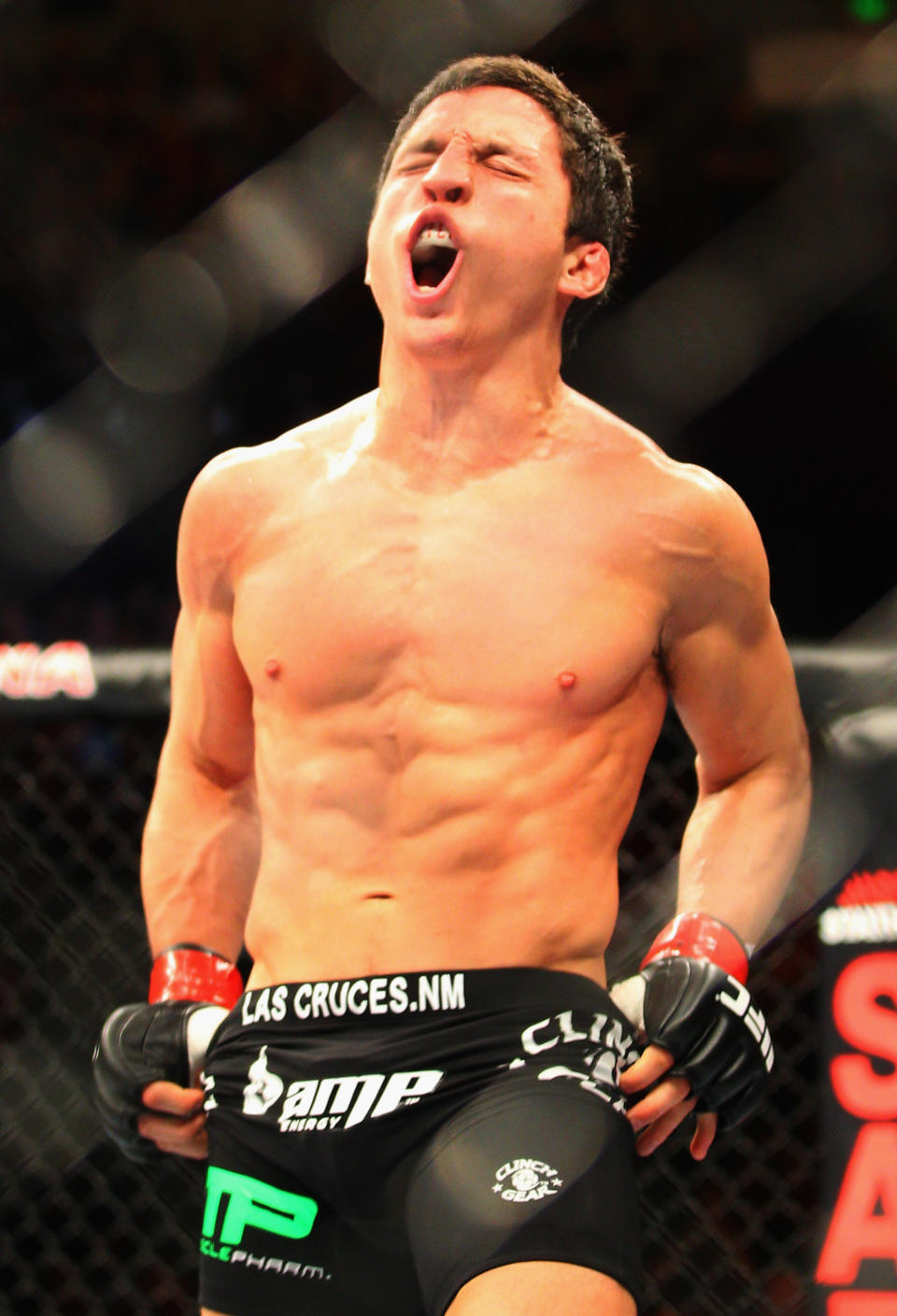 SYDNEY, AUSTRALIA - MARCH 03: Joseph Benavidez of the USA celebrates victory during the UFC On FX flyweight bout between Joseph Benavidez and Yasuhiro Urushitani at Allphones Arena on March 3, 2012 in Sydney, Australia. (Photo by Mark Kolbe/Getty Images)