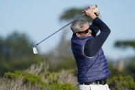 PGA Tour Commissioner Jay Monahan follows his drive from the ninth tee of the Monterey Peninsula County Club Shore Course during the first round of the AT&T Pebble Beach National Pro-Am golf tournament Thursday, Feb. 6, 2020, in Pebble Beach, Calif. (AP Photo/Tony Avelar)