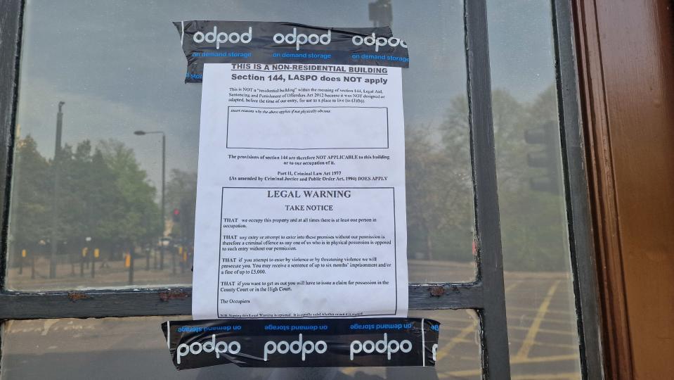 A ‘legal warning’ put up by the squatters defended their occupation and warned of legal action against anyone trying to ‘enter by violence’ (Piers Mucklejohn/PA)