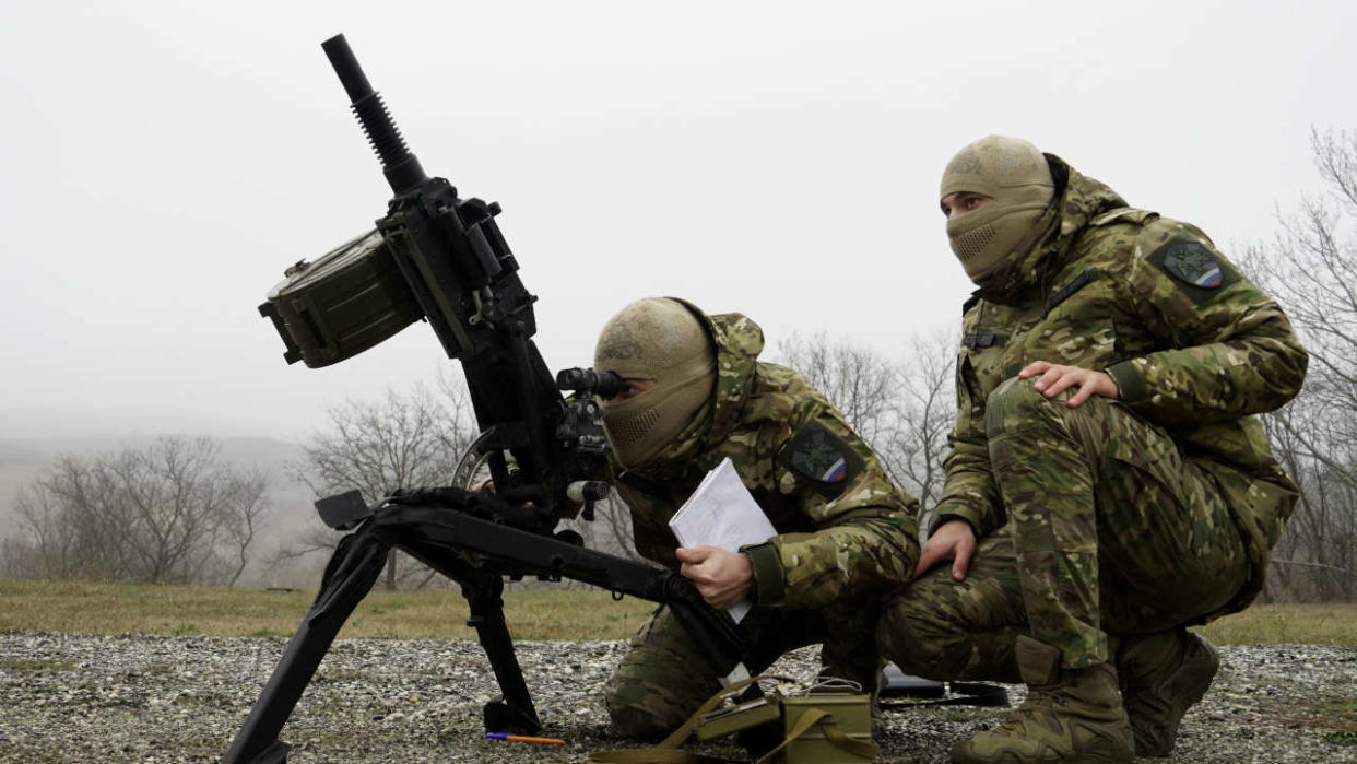 Volunteers and special force troopers are put through their paces during military training at a 