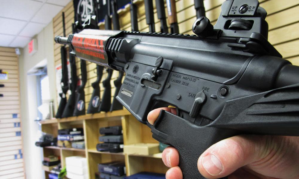 An employee of North Raleigh Guns demonstrates how a ‘bump’ stock works at the North Carolina shop.