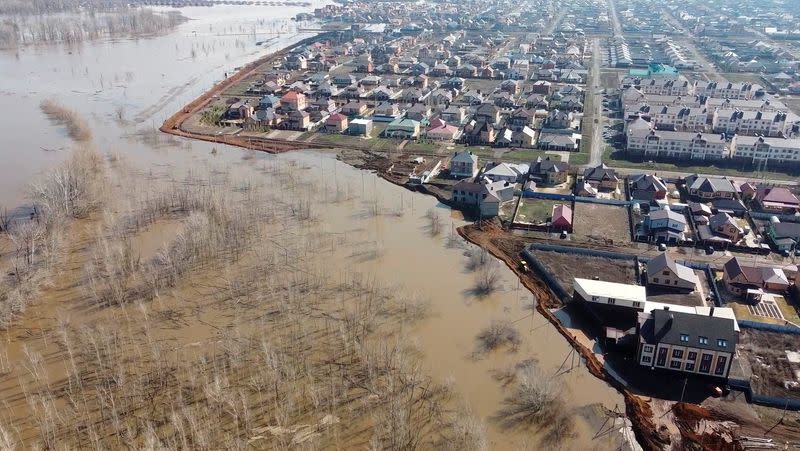 FILE PHOTO: Russian villagers build homemade dam to keep out floods, in Orenburg region