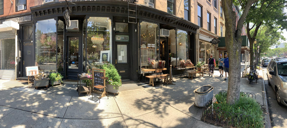 An Atlantic Avenue streetscape, by Collier West.