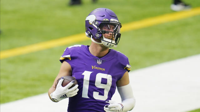 Minnesota Vikings wide receiver Adam Thielen (19) catches the pass