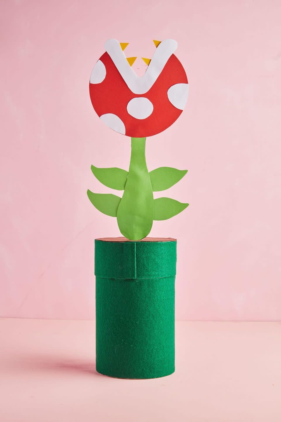 <p>Your kids will love dropping their Valentines into the mouth of this "carnivorous plant." It all starts with a paper tube!</p><p><strong>Get the tutorial at <a href="https://www.goodhousekeeping.com/holidays/valentines-day-ideas/g26066165/diy-valentines-box-ideas/?slide=1" rel="nofollow noopener" target="_blank" data-ylk="slk:Good Housekeeping" class="link rapid-noclick-resp">Good Housekeeping</a>.</strong></p><p><strong><a class="link rapid-noclick-resp" href="https://go.redirectingat.com?id=74968X1596630&url=https%3A%2F%2Fwww.walmart.com%2Fsearch%3Fq%3Dcard%2Bstock&sref=https%3A%2F%2Fwww.thepioneerwoman.com%2Fhome-lifestyle%2Fcrafts-diy%2Fg35119968%2Fvalentines-day-box-ideas%2F" rel="nofollow noopener" target="_blank" data-ylk="slk:SHOP CARD STOCK">SHOP CARD STOCK</a><br></strong></p>