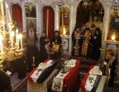 Clerics and other people attend the funeral of three men at Catholic Patriarchate in Damascus September 10, 2013. REUTERS/Khaled al-Hariri