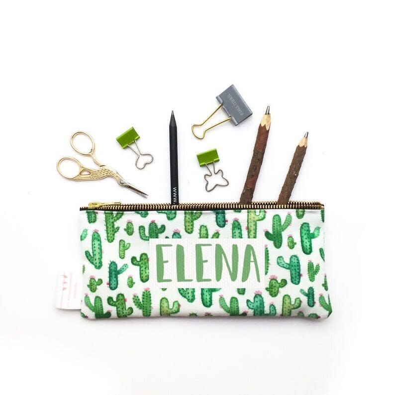 Get a personalized pouch in plenty of prints, patterns and sizes. <strong><a href="https://fave.co/2ML64MJ" target="_blank" rel="noopener noreferrer">Originally $18, get it for up to 20% off during Etsy's Back-To-School Sale</a></strong>.