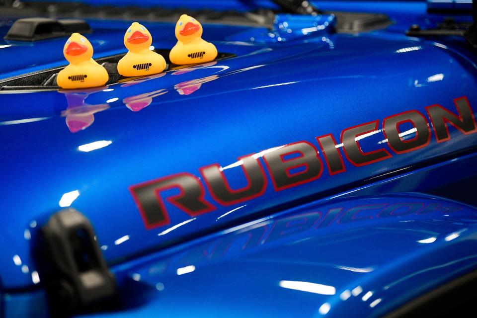 Rubber ducks sit atop a Jeep Rubicon at the Knoxville Auto Show at the Knoxville Convention Center in Knoxville, Tenn. on Friday, Feb. 4, 2022.