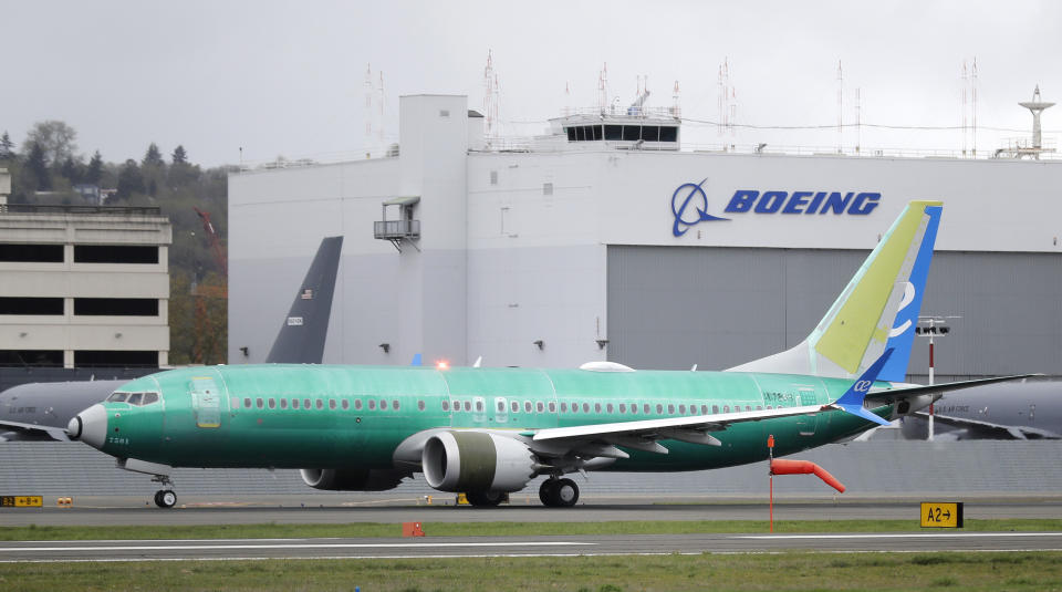 FILE - In this April 10, 2019, file photo a Boeing 737 MAX 8 airplane being built for Spain-based Air Europa rolls toward takeoff before a test flight at Boeing Field in Seattle. The head of the Federal Aviation Administration is defending his agency's approval of a troubled Boeing plane while leaving open the possibility of changing how the agency certifies aircraft. Stephen Dickson made the comments Monday, Sept. 23, in Montreal, where he and other top FAA officials briefed aviation regulators from around the world on the agency's review of changes that Boeing is making to the 737 Max. The FAA said a senior Boeing official also gave a technical briefing. (AP Photo/Ted S. Warren, File)