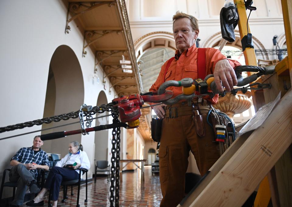 French high-wire artist Philippe Petit makes preparations ahead of his performance in the Great Hall of the National Building Museum in Washington, DC on March 21, 2023. - Petit will perform 