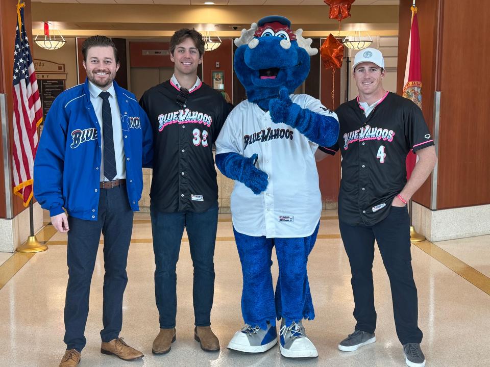 From left, Pensacola Blue Wahoos play-by-play broadcaster Erik Bremer, pitcher Ike Buxton, mascot Kazoo and third baseman Jacob Berry get ready to visit some patients at the HCA Florida West Hospital on Thursday, Jan. 18, 2024.