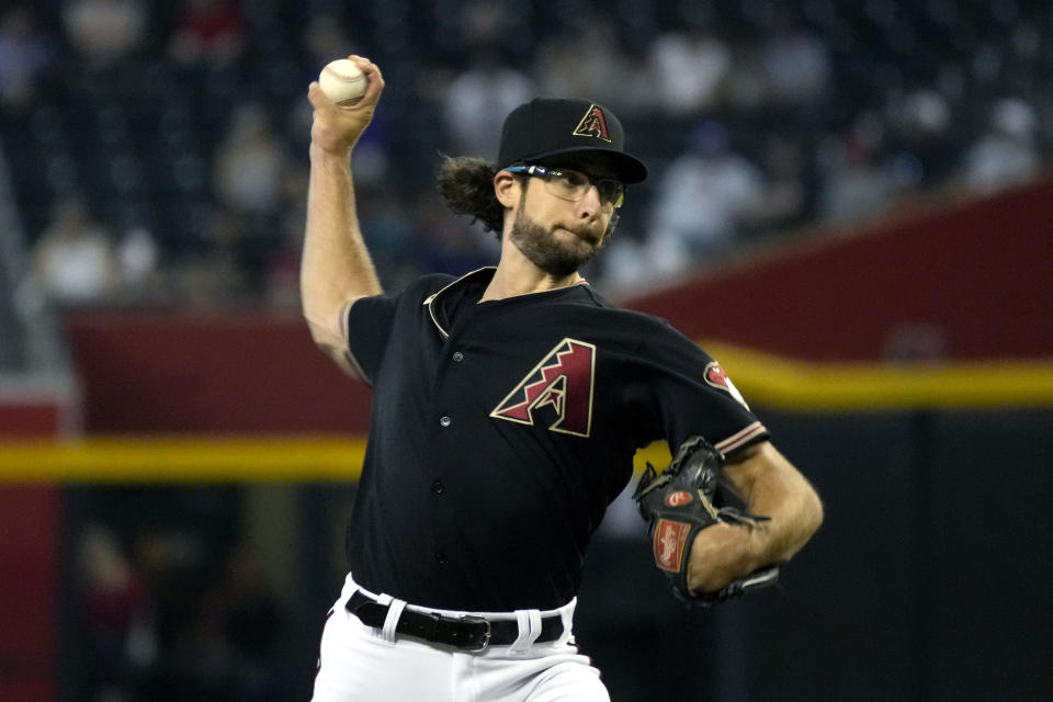 Arizona Diamondbacks pitcher Zac Gallen throws in the first inning of a baseball game against the San Francisco Giants, Wednesday, July 27, 2022, in Phoenix. (AP Photo/Rick Scuteri)