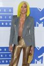 From her neon yellow wig to her gold flares, Cassie went all out - but it looked all wrong at the MTV VMAs in 2016.