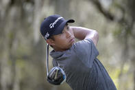 Collin Morikawa watches his tee shot on the ninth hole during the final round of the Workday Championship golf tournament Sunday, Feb. 28, 2021, in Bradenton, Fla. (AP Photo/Phelan M. Ebenhack)