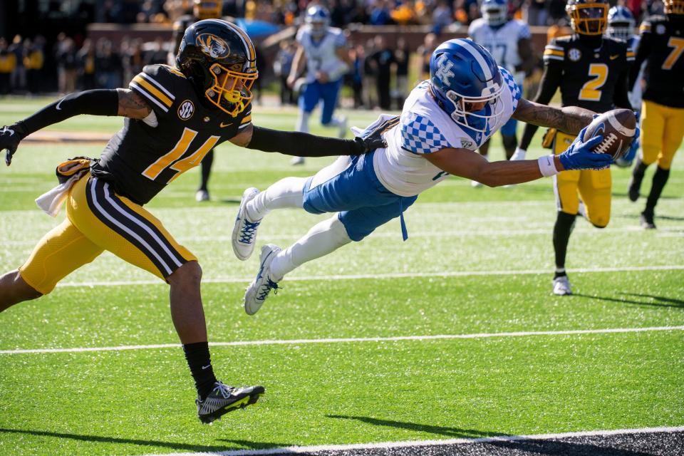 UK's Dane Key dives over the goal line for a touchdown against Missouri in November 2021.