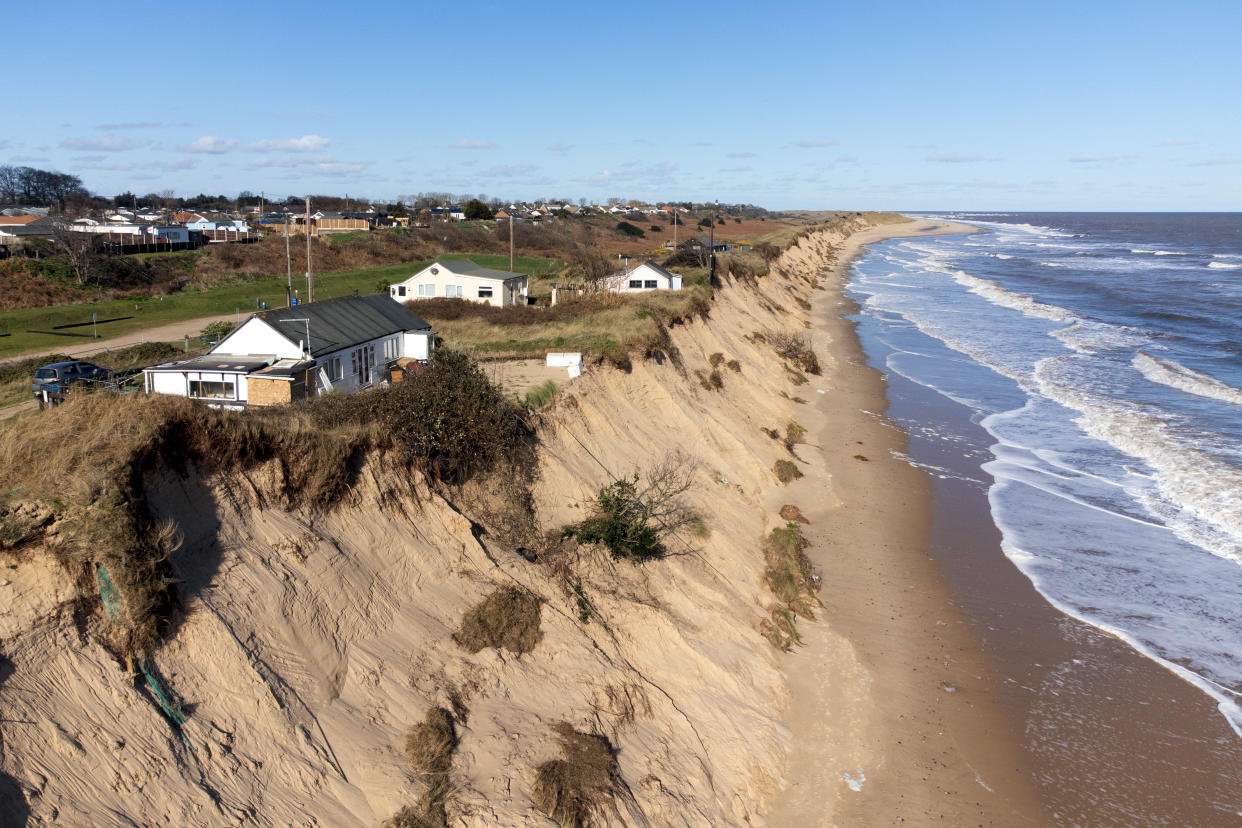Homes sit close to the cliff edge at Hemsby in Norfolk, where the beach has been closed off because of significant erosion and the risk that homes could fall into the sea. Picture date: Sunday February 26, 2023. (Photo by Joe Giddens/PA Images via Getty Images)
