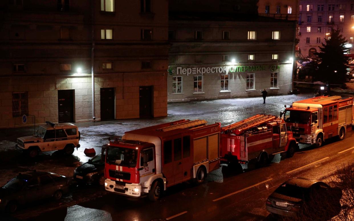 Vehicles of emergency services are parked near a supermarket after an explosion in St Petersbur - REUTERS