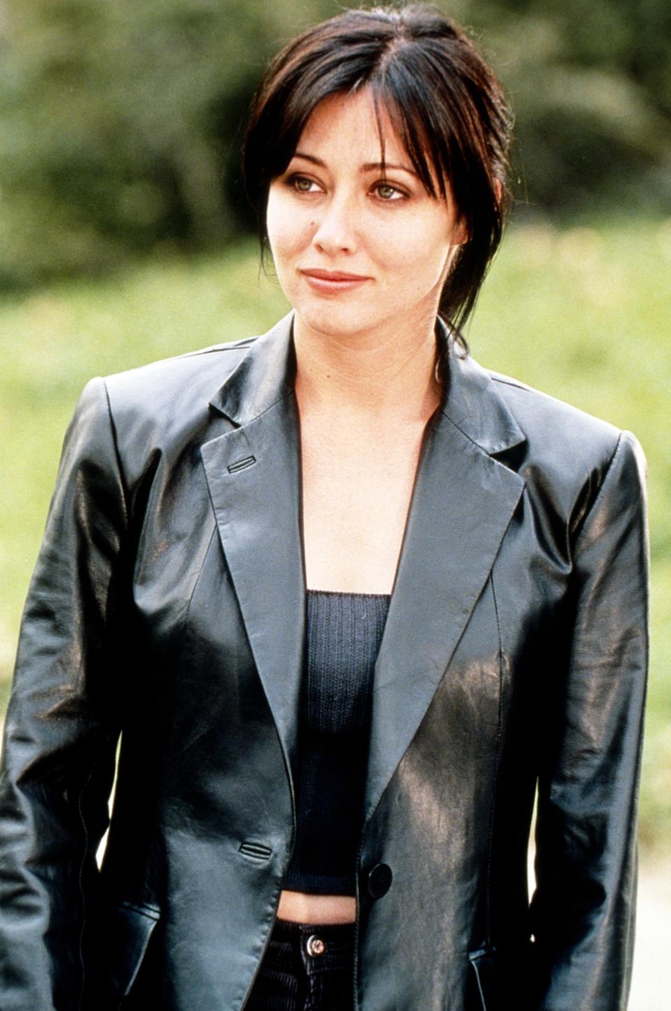 closeup of her character in a leather jacket